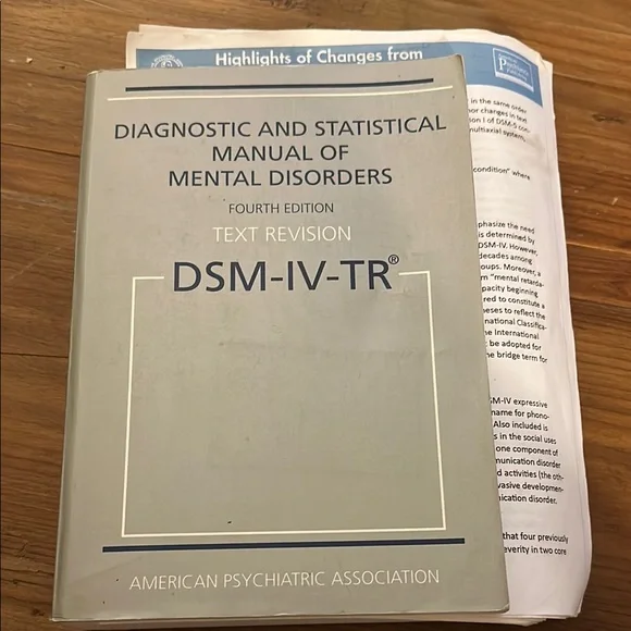 DSM-IV-TR Manual with DSM 5 Updates Printed Out - Picture 1 of 4